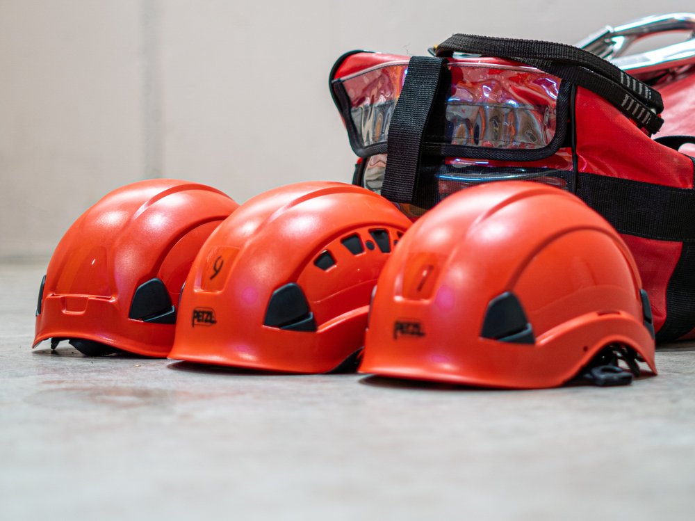 three-red-hard-hats